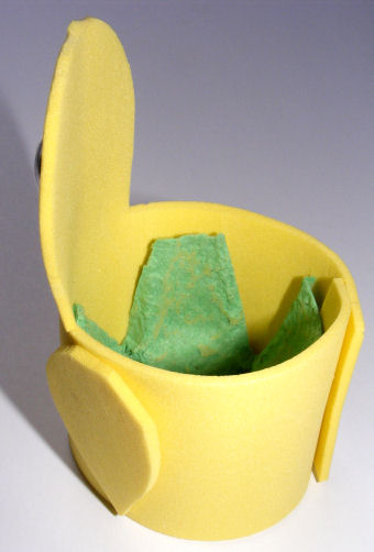 Showing the cardboard egg box section dropped inside the foam egg cup, ready to support your boiled egg