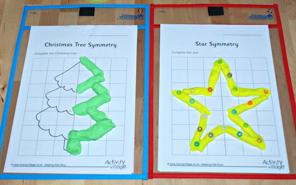 More Christmas symmetry pages completed with playdough