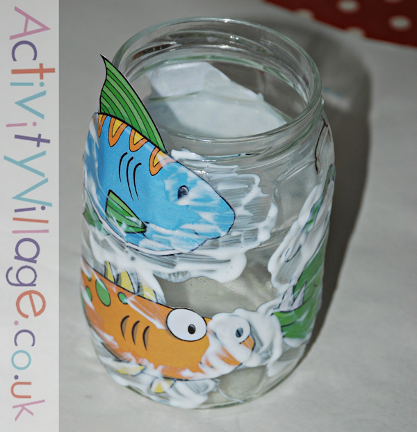 Fish images glued onto a jar