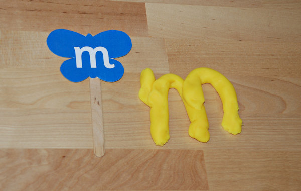 Making a letter in playdough