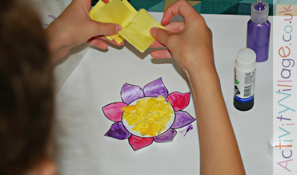 Creating a flower collage with scrunched up tissue paper