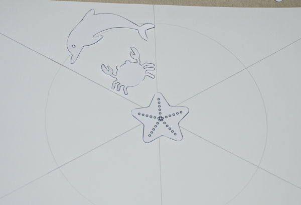 Planning what goes where on our sea creature mandalas using templates
