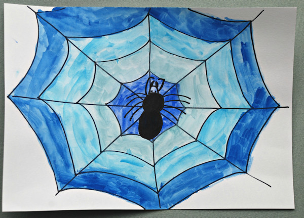 Here is one of his finished spider web pictures