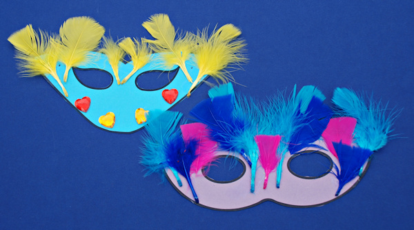 Masks decorated with feathers