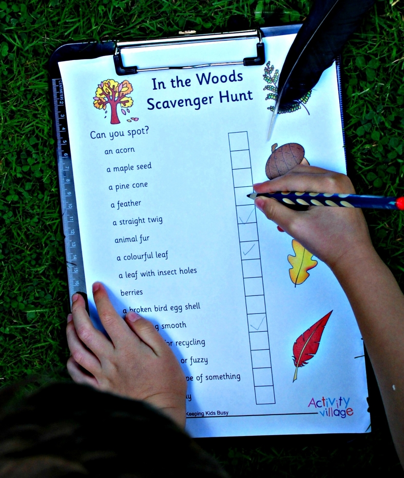 Checking off items on our In the Woods Scavenger Hunt printable