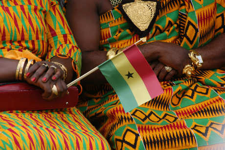 Ghanaian women dressed in traditional kente cloth