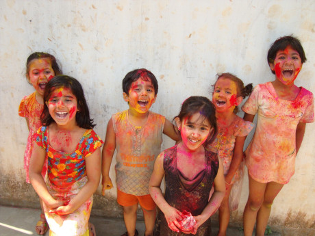 Children enjoying Holi