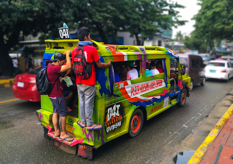 Passengers piled on to a jeepney, the colourful local transport in the Philippines