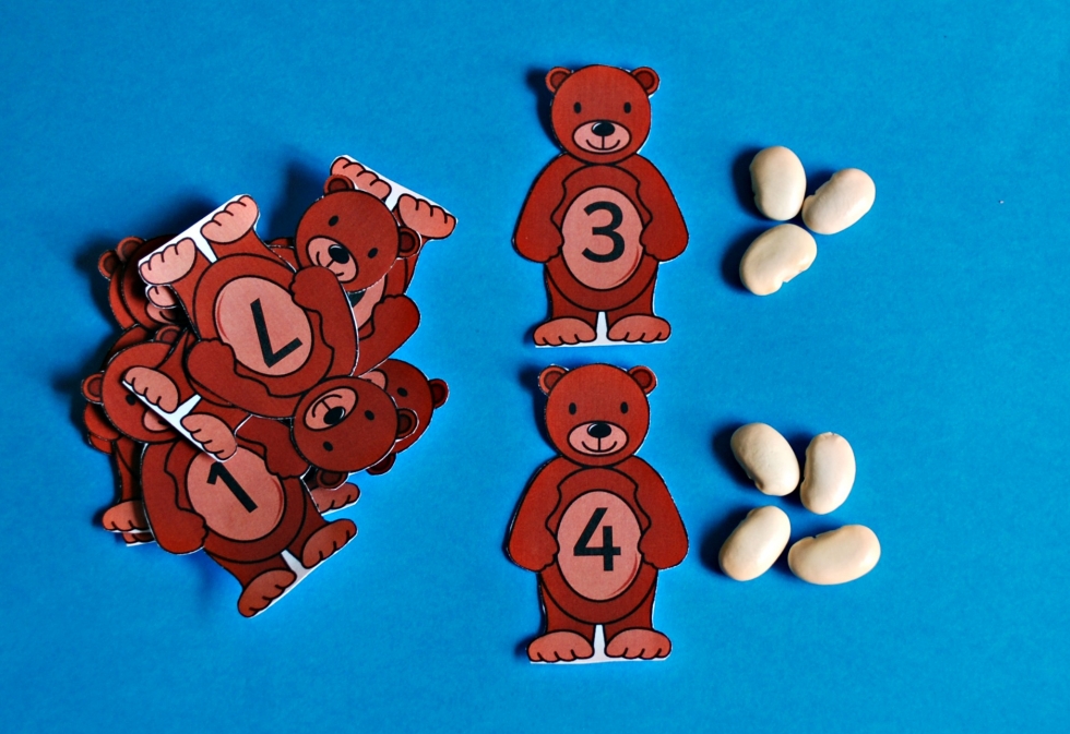 Numbered teddy bears matched to dried butter beans