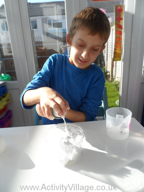 Puffy paint ghost - Sam is mixing together equal amounts of shaving foam and PVA