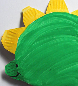 Paper plate stegosaurus - face detail