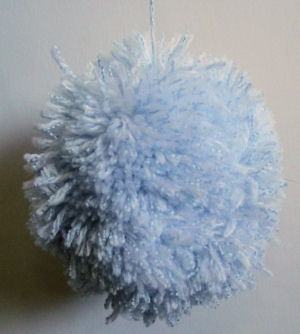 Our pompom bauble, using a pale blue wool