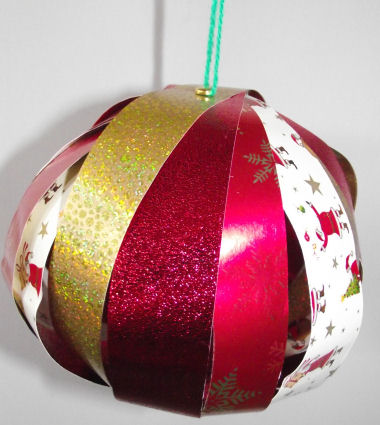 Wrapping paper bauble craft - showing 4 different sheets of Christmas wrapping paper