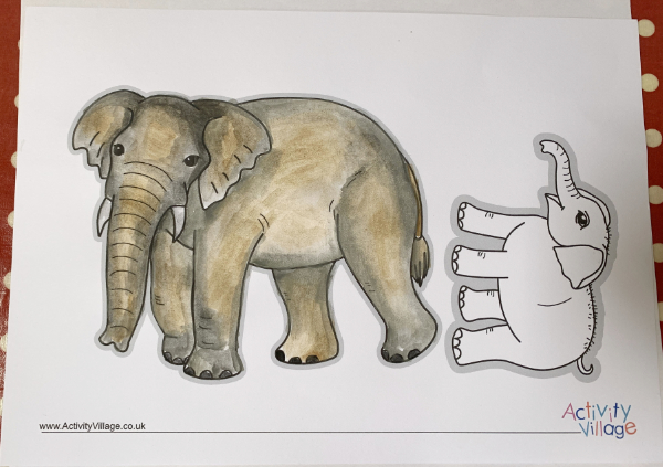 Painting an elephant colouring page with watercolours