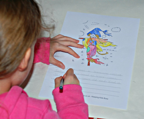 Writing a story about a scarecrow using Activity Village story paper
